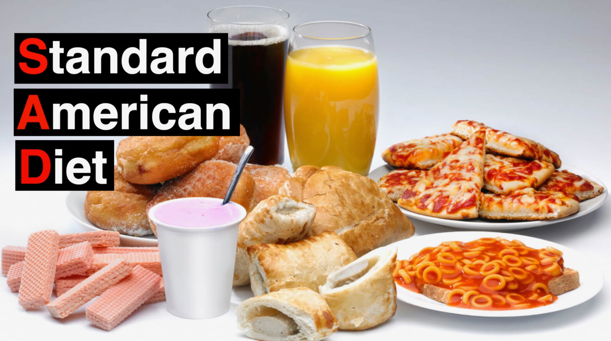 The Standard American Diet with sausage rolls, orange juice, soda, pizza, wafers and more