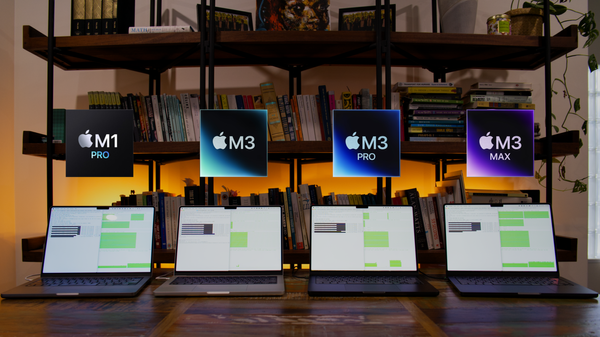 A workspace with open laptops with graphs on their screens, also displaying "M1 Pro," "M3," "M3 Pro," and "M3 Max" logos.